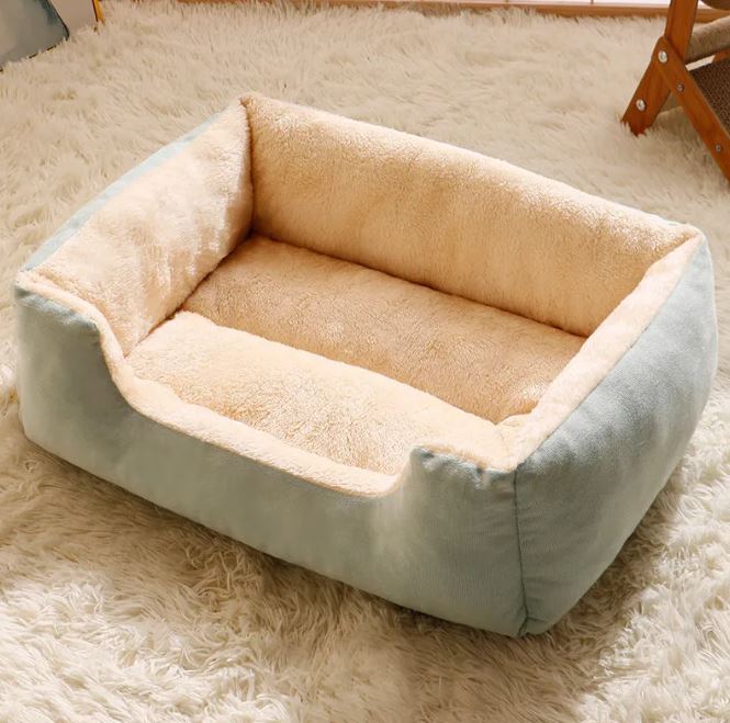 Warm and cozy cat bed by My Store, soft fabric with a plush interior, designed for comfort and relaxation.