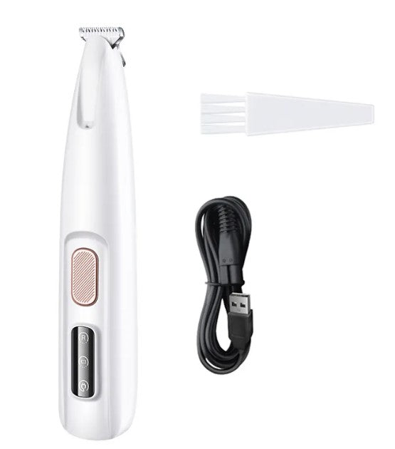Pets paw trimmer with LED light by Fins, Feathers & Fur, showing a close-up of the device trimming a pet&